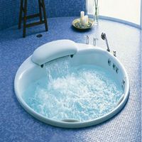 Kholer round whirlpool with waterfall spout 